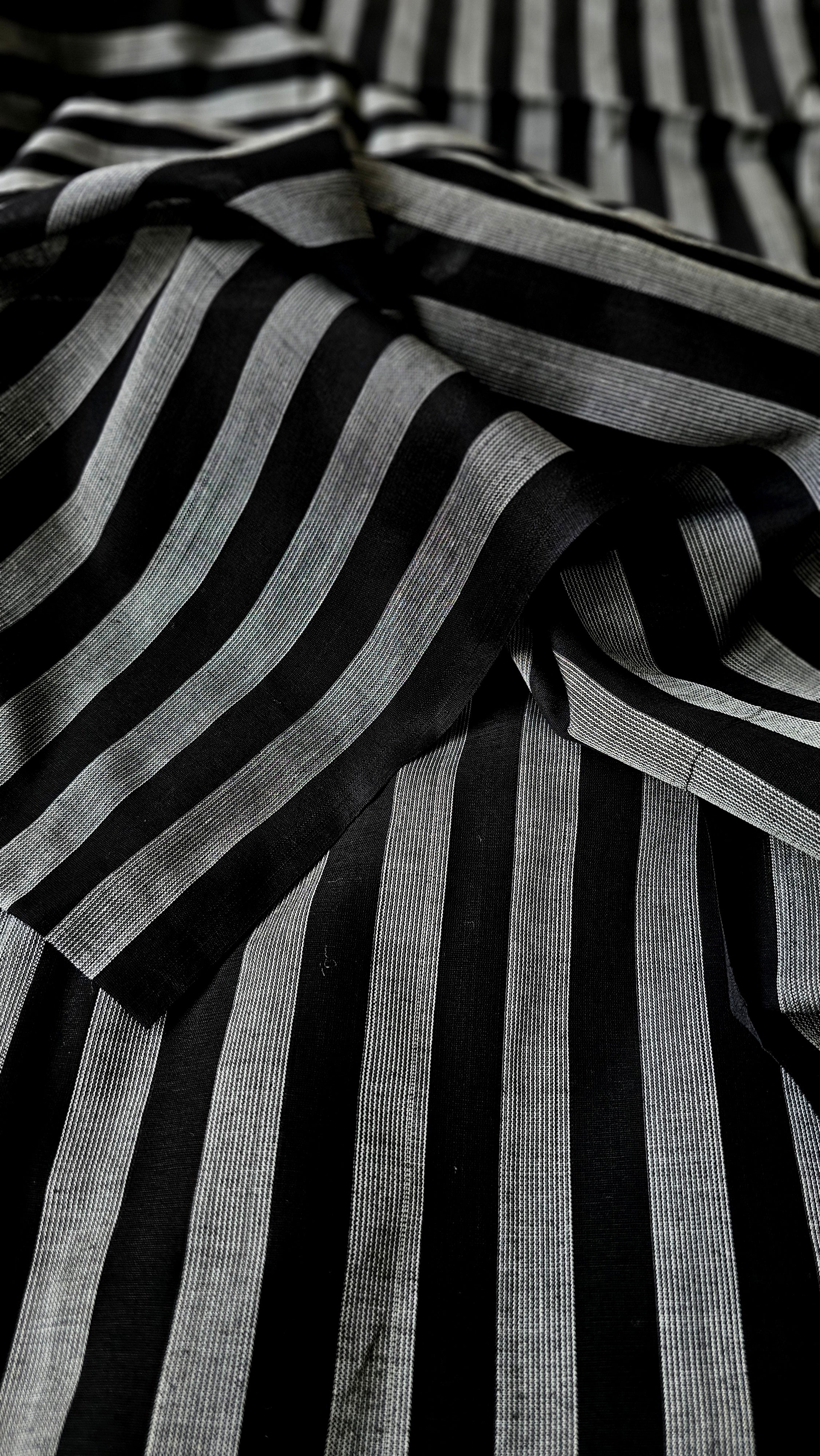 Fabrics with Black and White Warp Stripes.