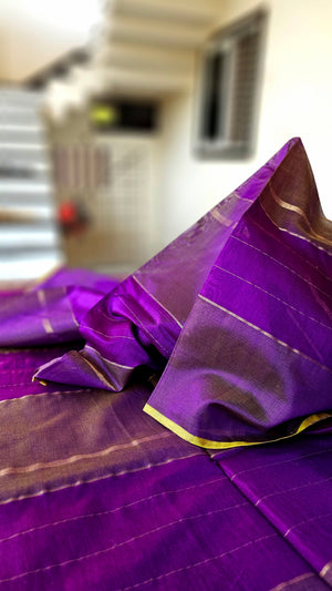 Purple Fabric with Gold Zari Warp Stripes.
