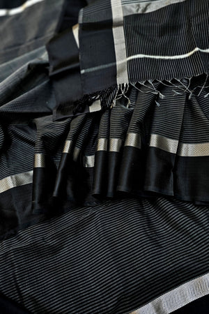 Black Saree with White Stripes and Silver Zari Borders.