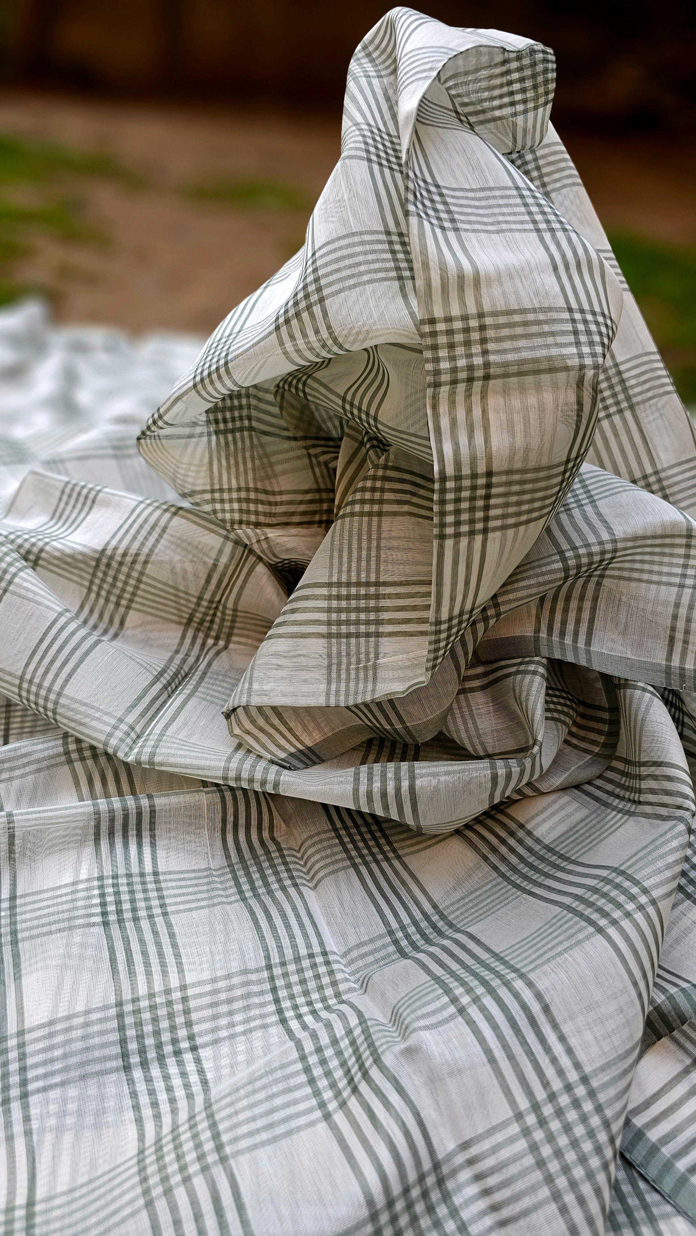 Fabric with Checks of Military Green and Off White.