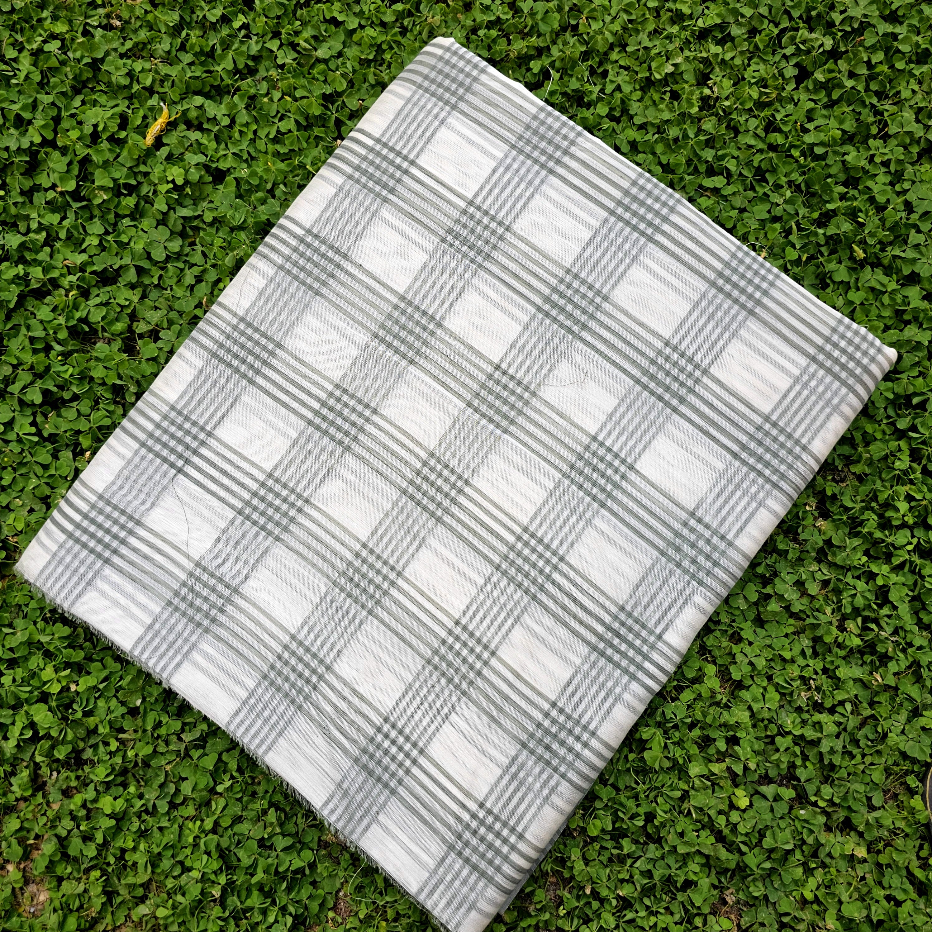 Fabric with Checks of Military Green and Off White.