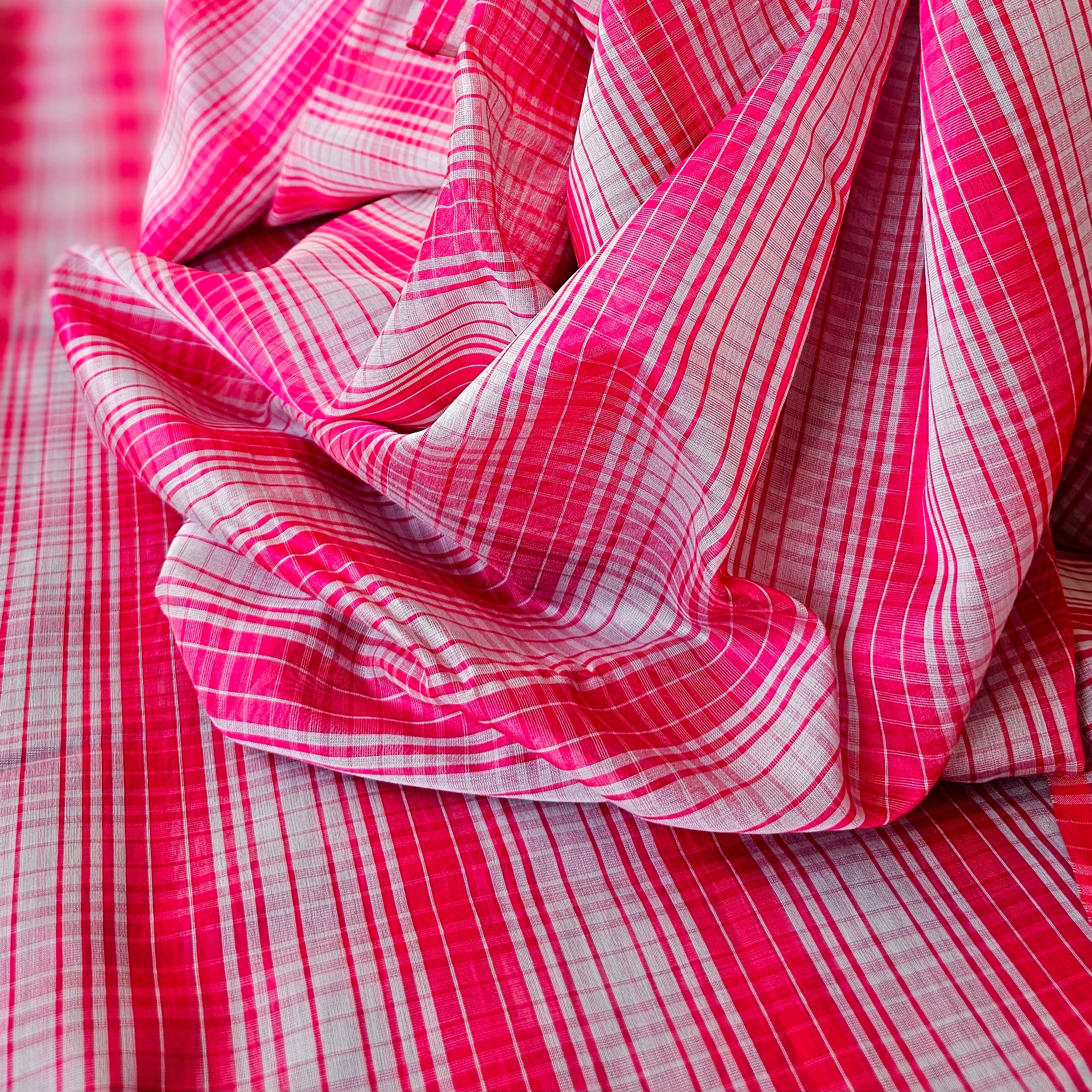 Grey and Pink Checks running Fabrics.