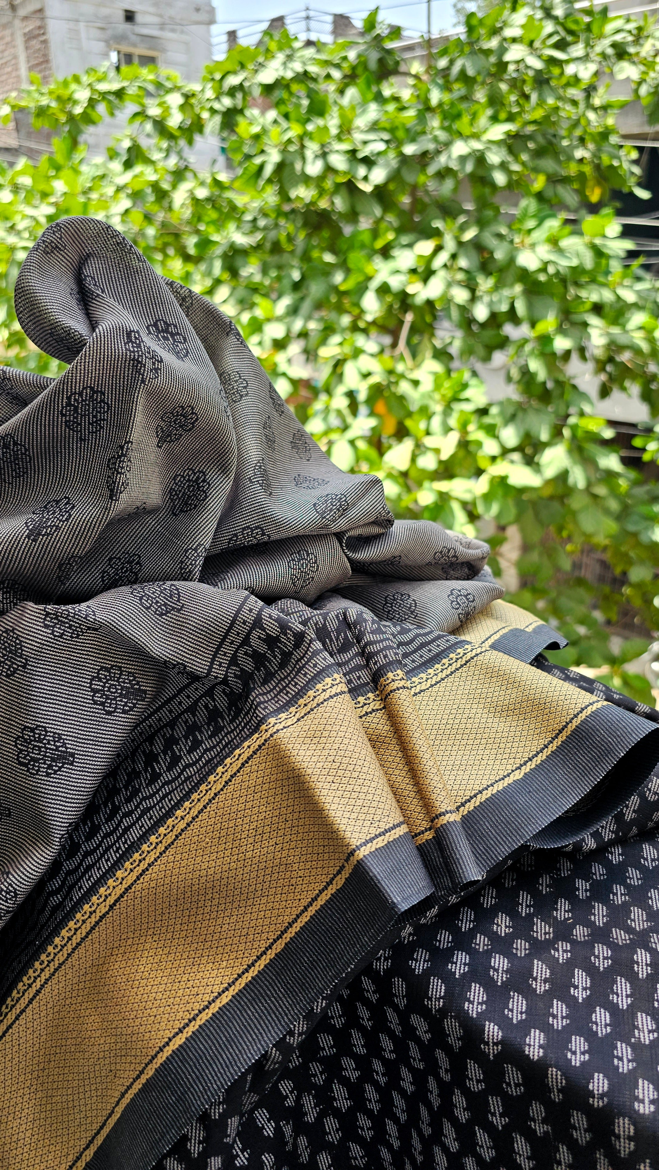 1×1 Weft Stripe Saree with Pale Yellow thread Chatai Borders and Bagh Prints.