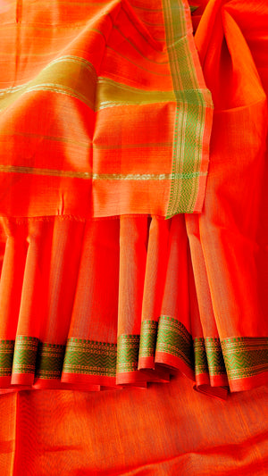 Bright Orange Saree with Green Resham Borders.