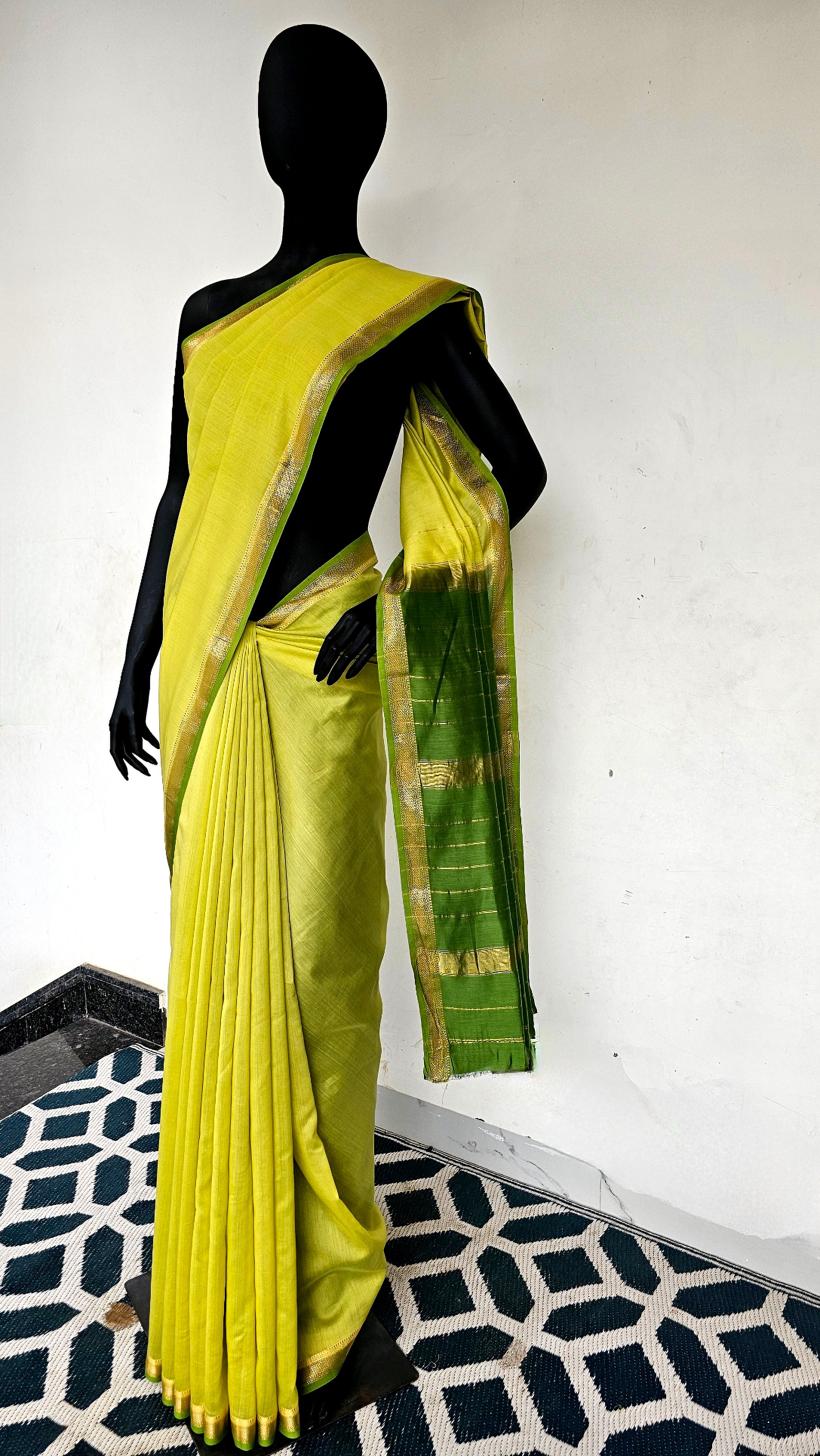 Lime Green Saree with Forest Green Pallu and Blouse with Gold Zari Borders.