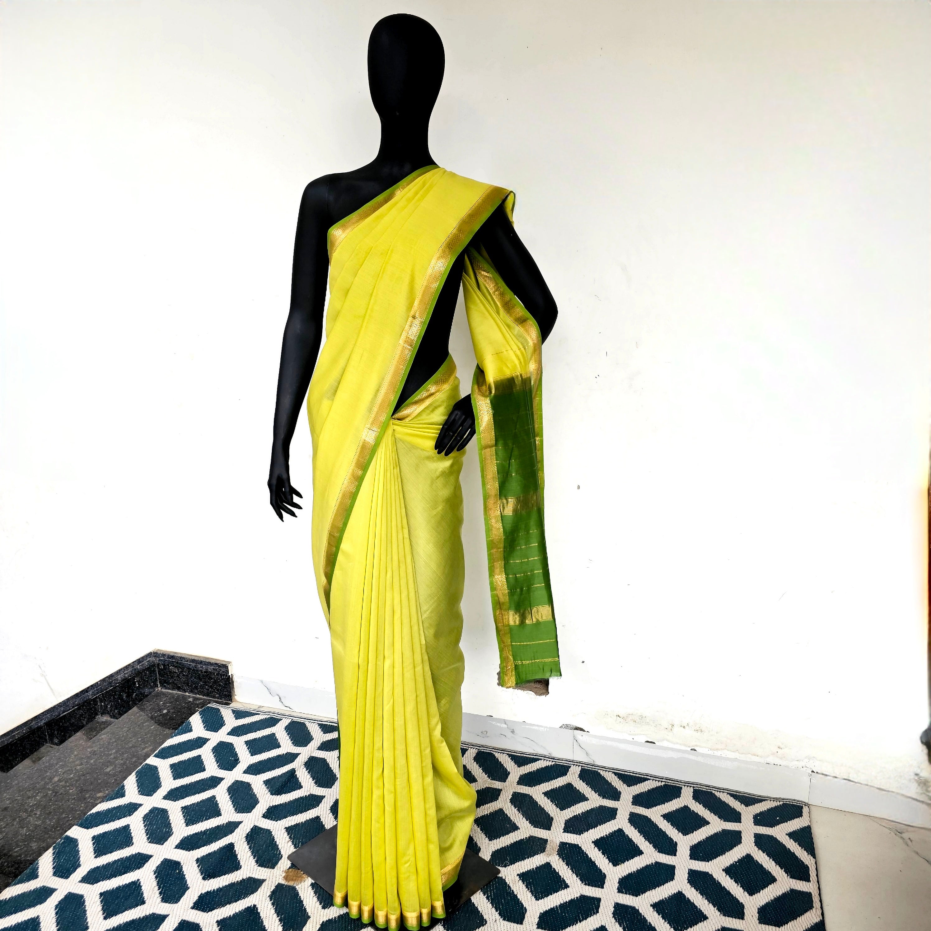 Lime Green Saree with Forest Green Pallu and Blouse with Gold Zari Borders.
