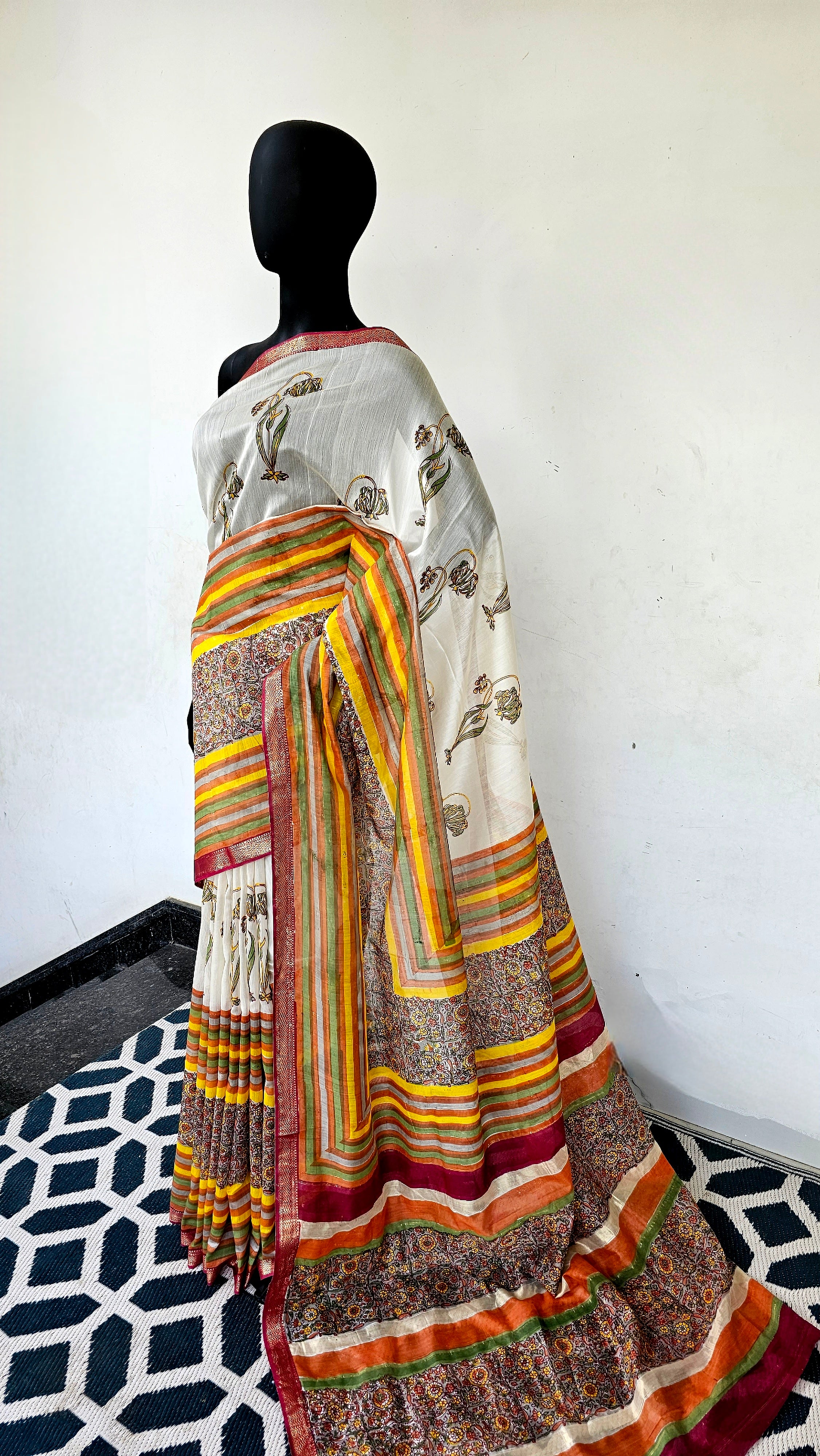 Maheshwari Handwoven Saree with Hand Block prints and Gold Zari Borders.