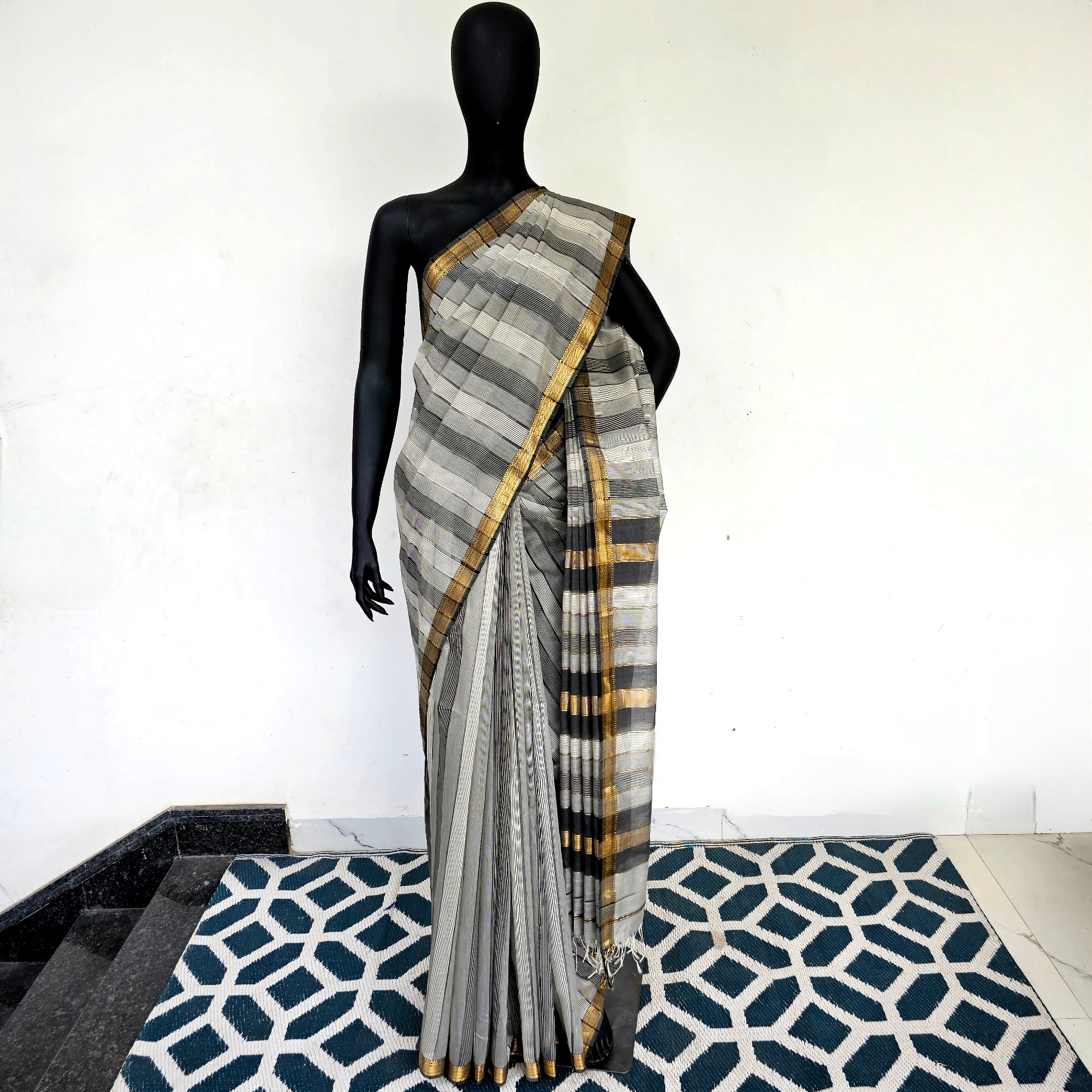 Saree with missing Wefts and Gold Zari Borders.