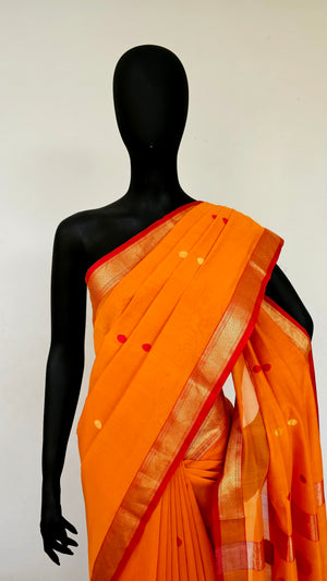 Bright Orange Saree with Booties,Butas and Red/Gold  Zari Borders.