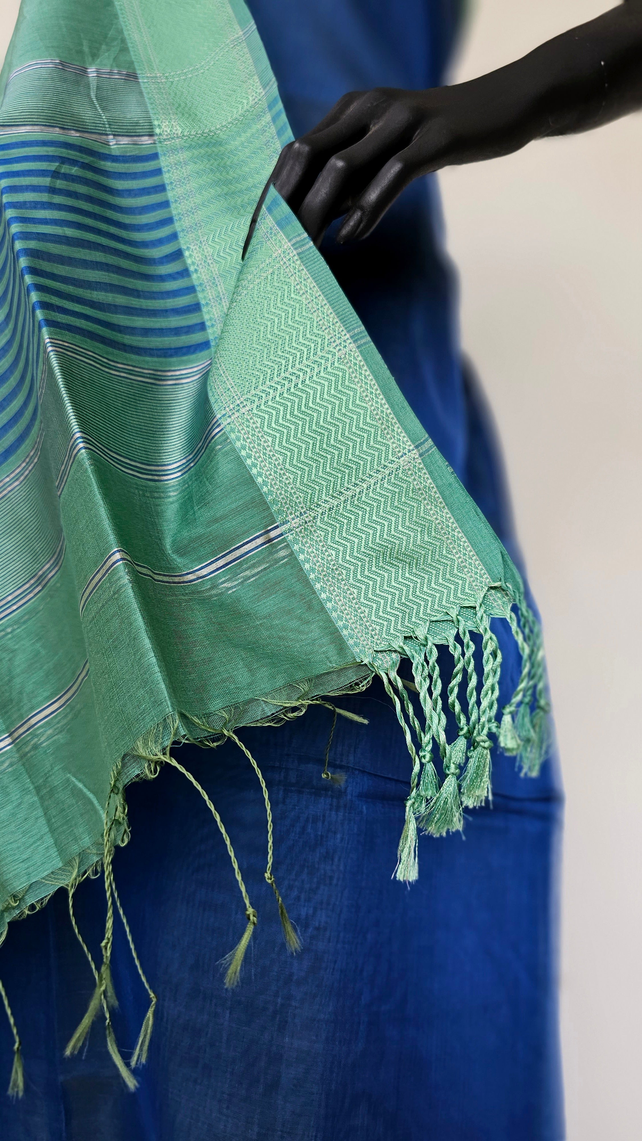 Explore the Weaving Legacy: Blue and Olive Green Elegance at Rehabar Handloom.