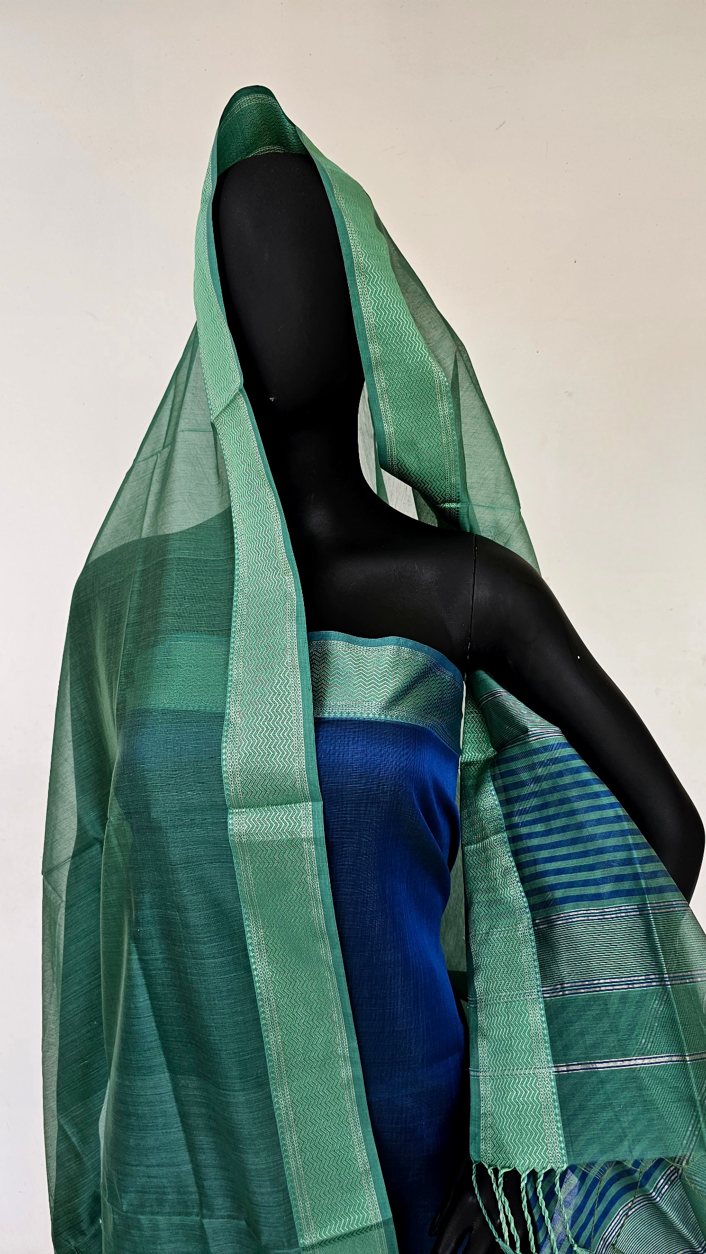 Explore the Weaving Legacy: Blue and Olive Green Elegance at Rehabar Handloom.