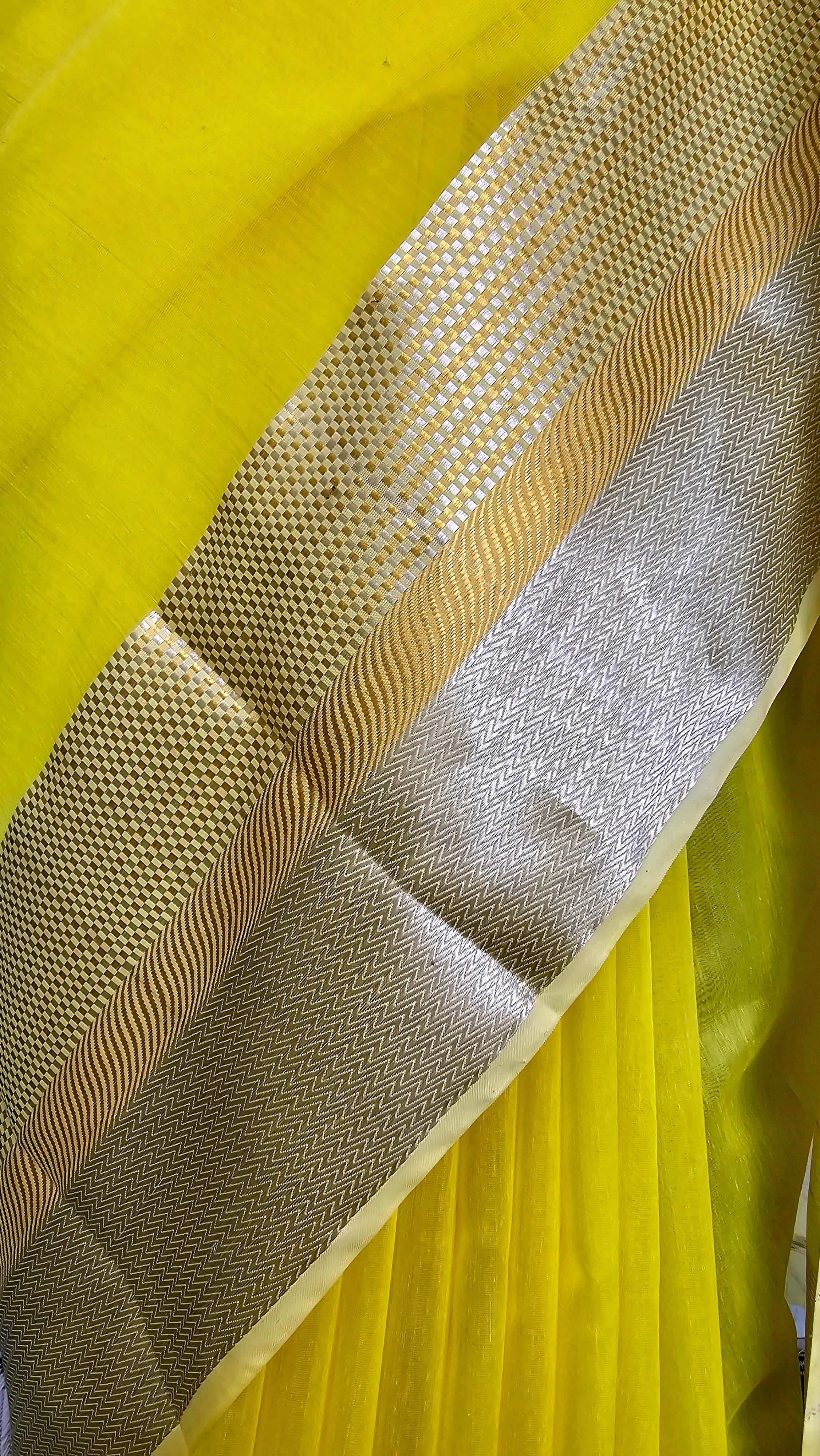 Saree Extravaganza: Lemon Yellow Beauty with Silver and Gold Zari Borders for Festivals
