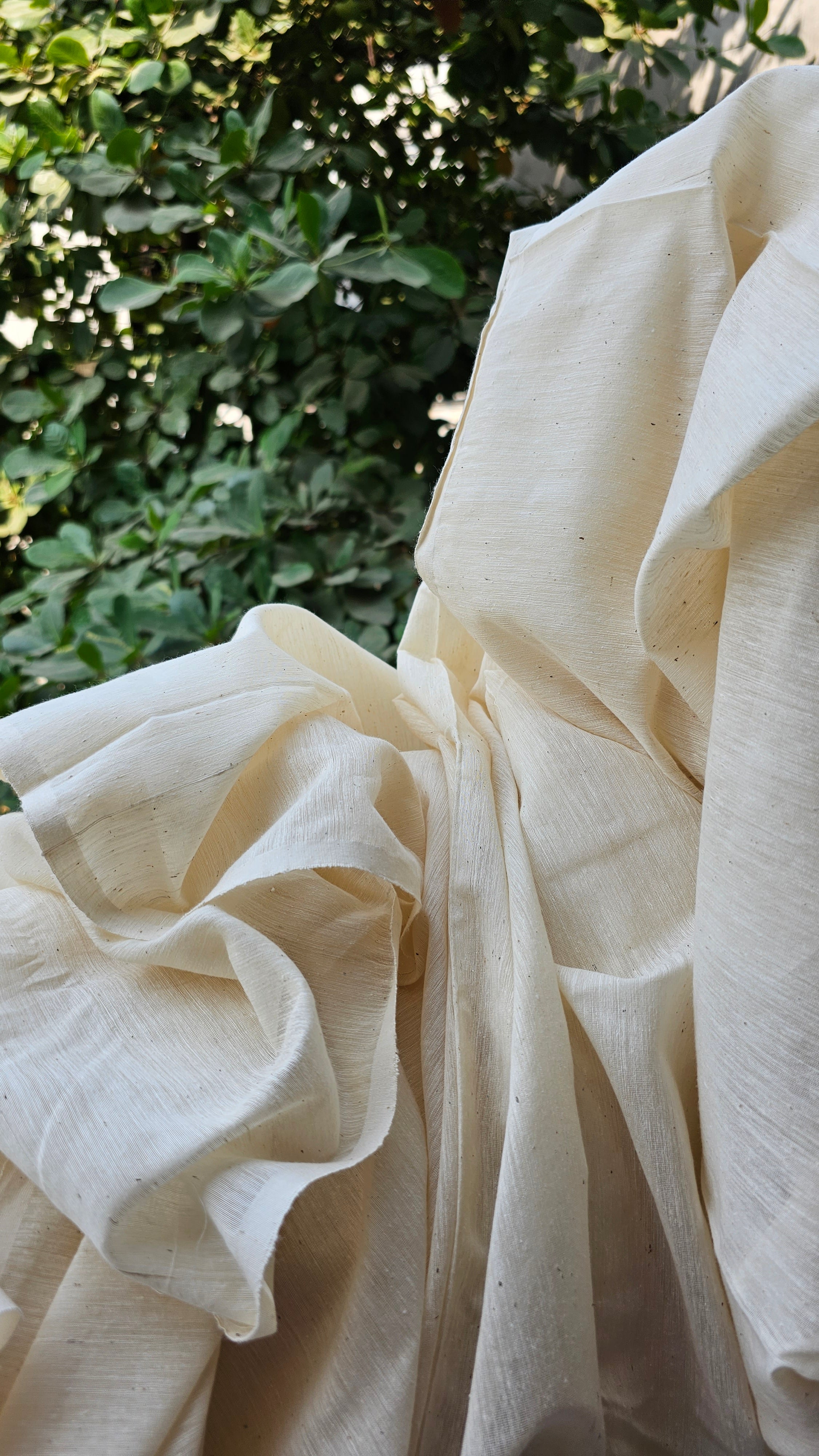 Fabric Enchantment with Handspun Cotton Weft, Handwoven Elegance, and Natural Off-White Splendor