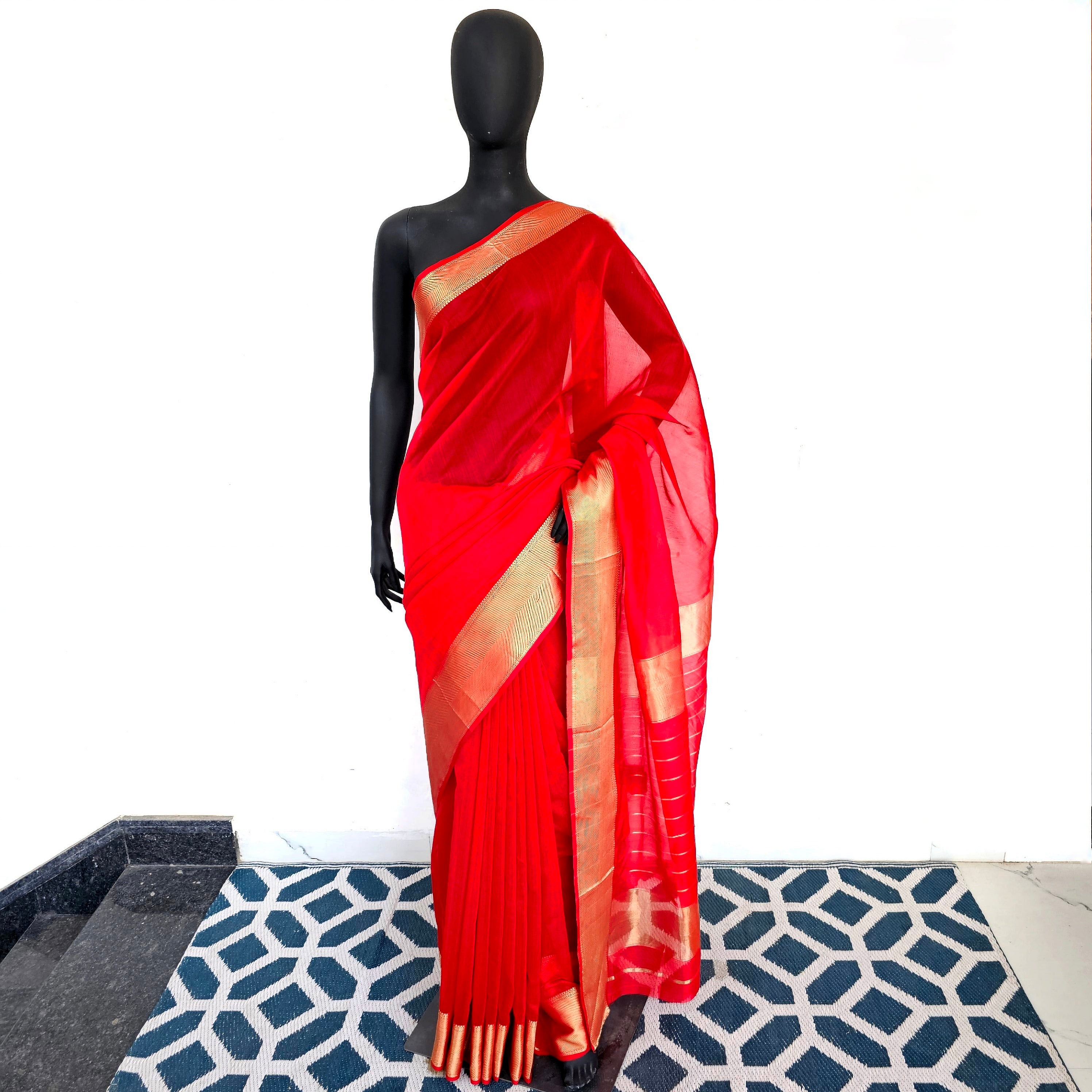 Karwa Chauth Glamour: Red Saree with Golden Borders.