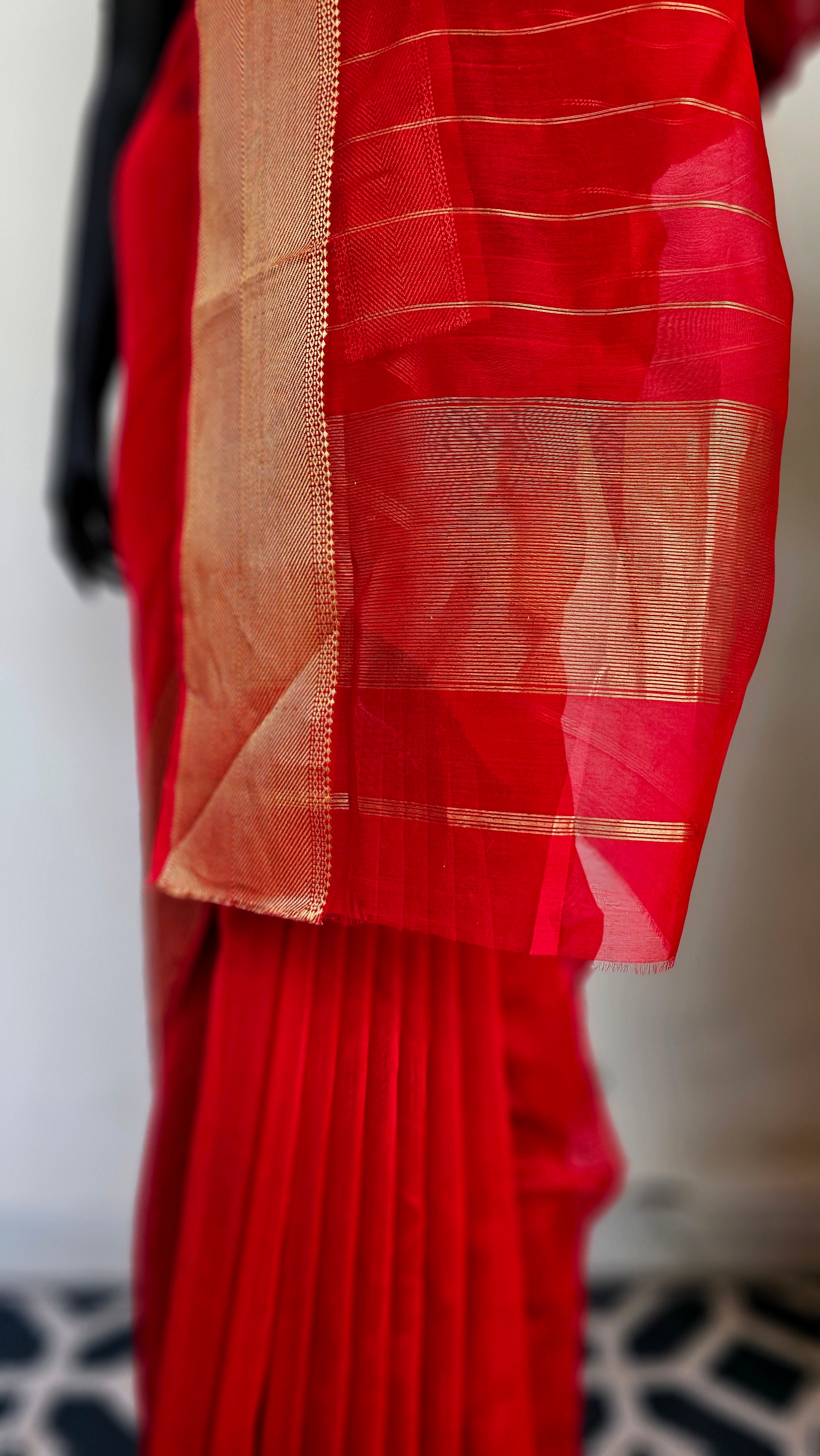 Karwa Chauth Glamour: Red Saree with Golden Borders.