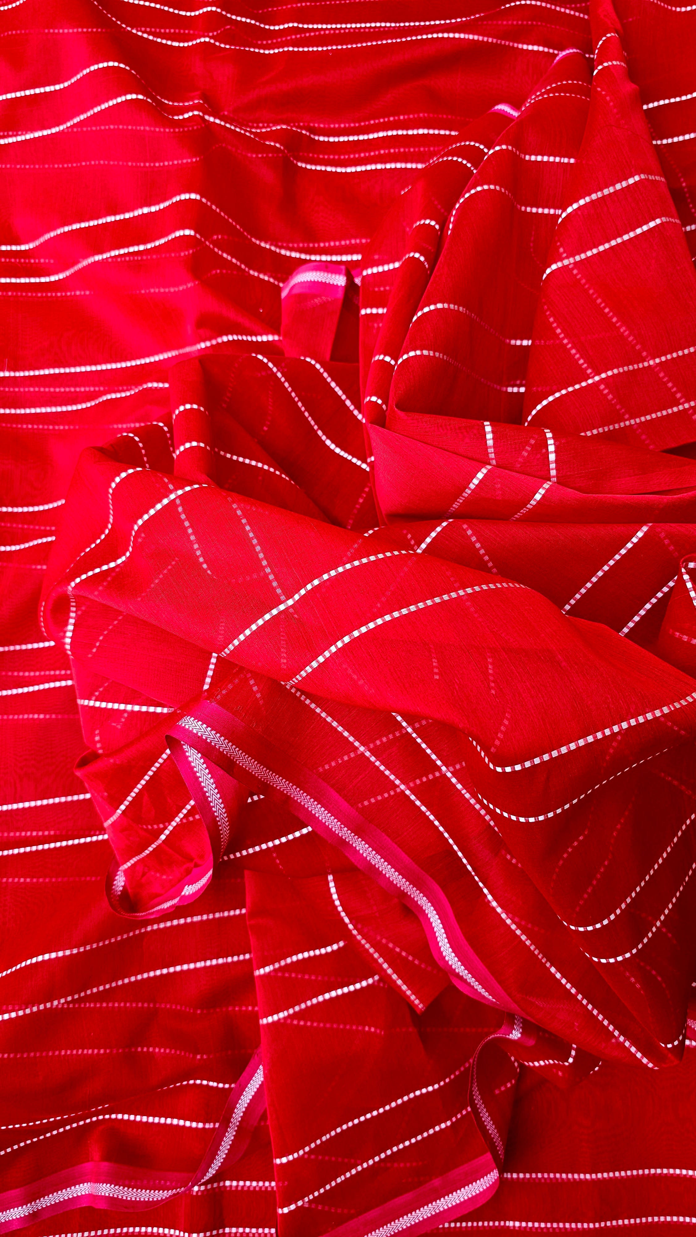 Red Fabric with White Muthda lines and Pink Borders.