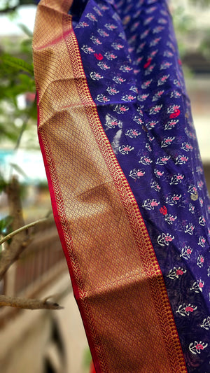 Saree with Hand Block prints and Gold Zari Borders.