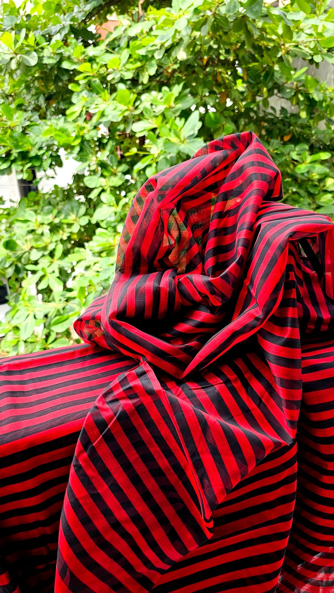 Timeless Weaves: Red & Black Striped Fabric