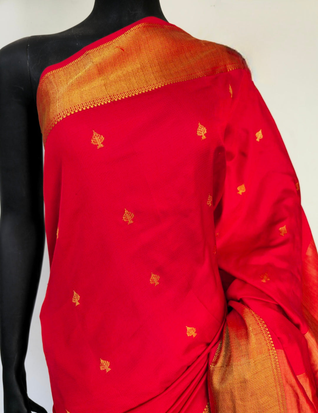 Draped in Desire: "Mashru" Mulberry Silk Saree, "Peepal Patta" Adorned, in Luscious Red.
