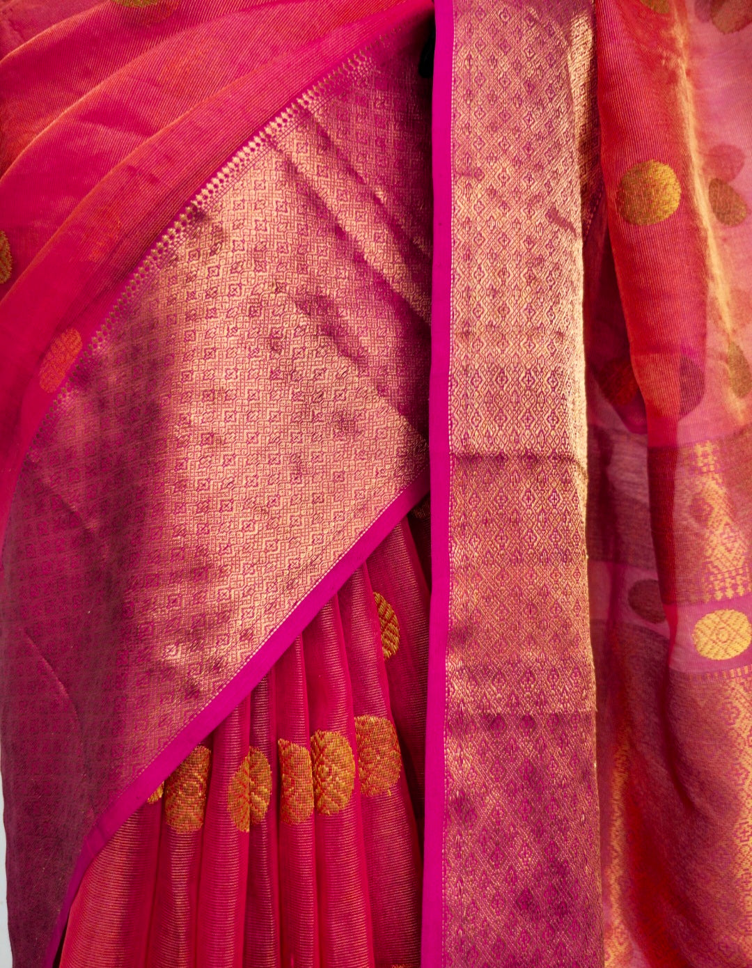 Regal Rani Pink Saree: Weaving the Beauty of Gold Tissue Organza, Gold Butas, and Jaala Palla.
