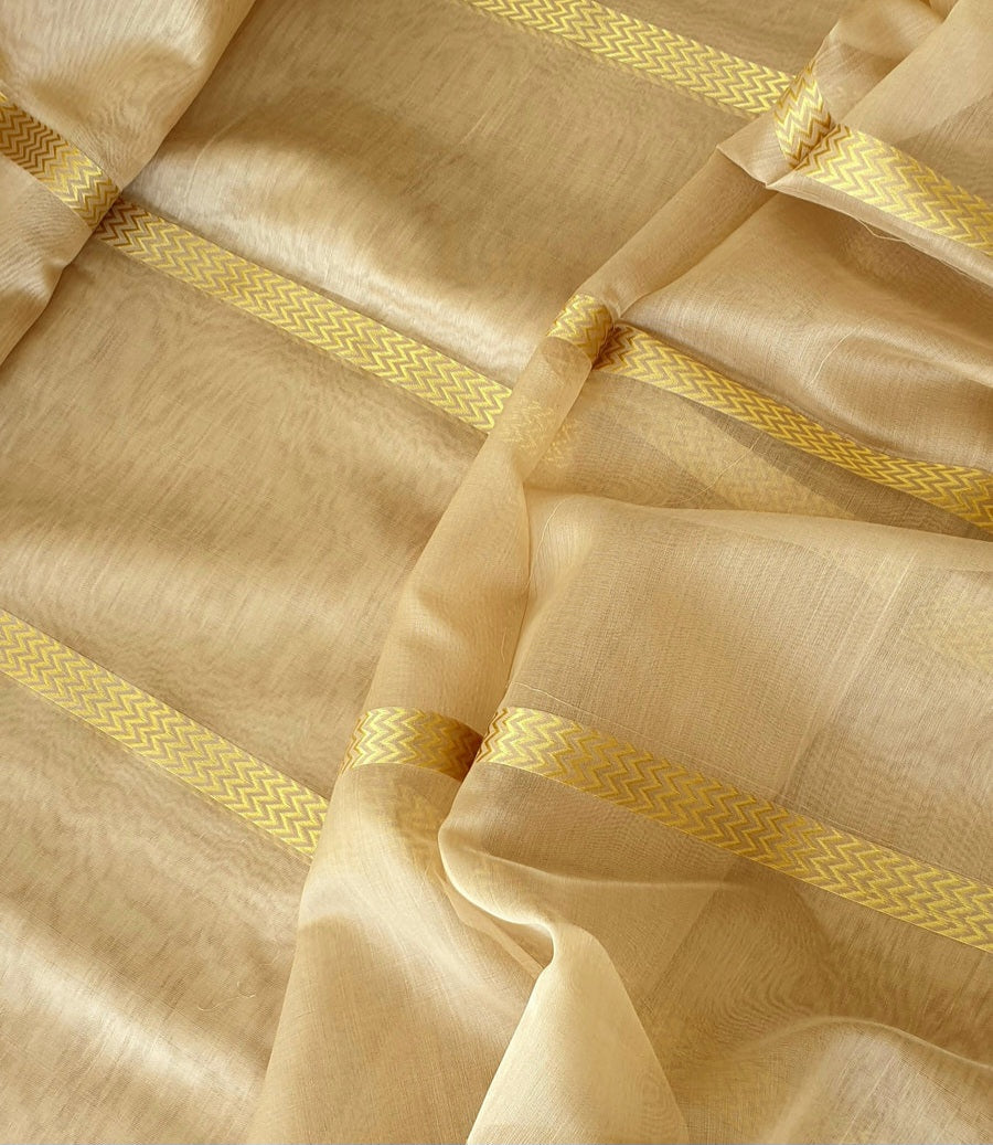 Beige Running Fabric with 5 Chevron Gold Zari Borders.