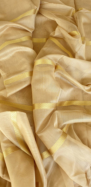 Beige Running Fabric with 5 Chevron Gold Zari Borders.