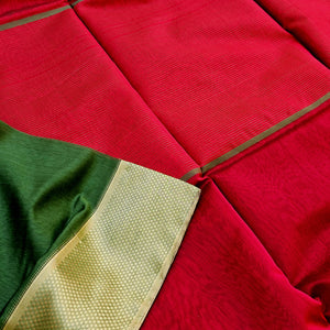 Green Saree with Red Pallu and Blouse.