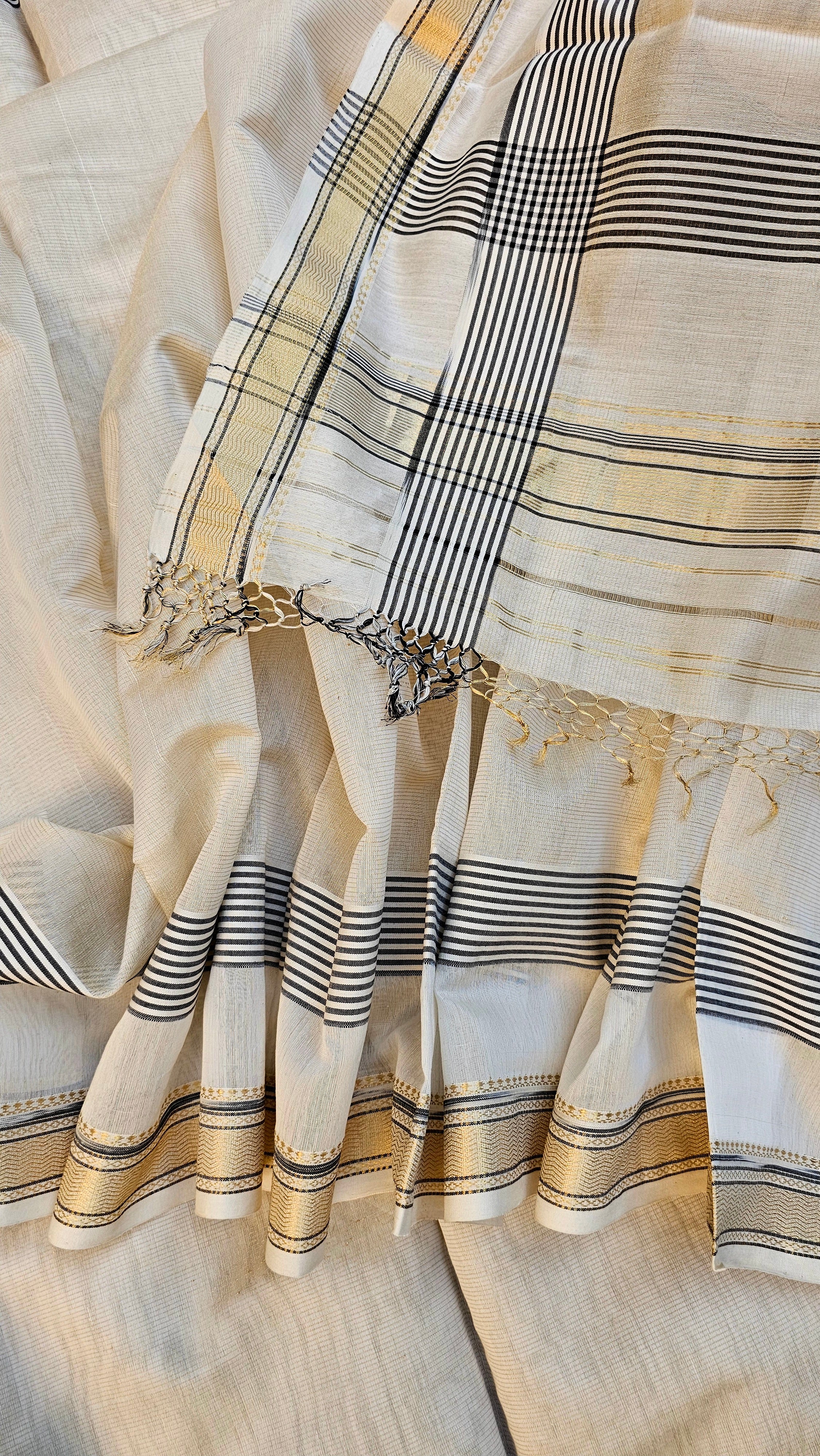 Off White Gold Tissue Saree with Traditional "Katari" Borders.