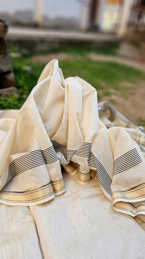 Off White Gold Tissue Saree with Traditional "Katari" Borders.